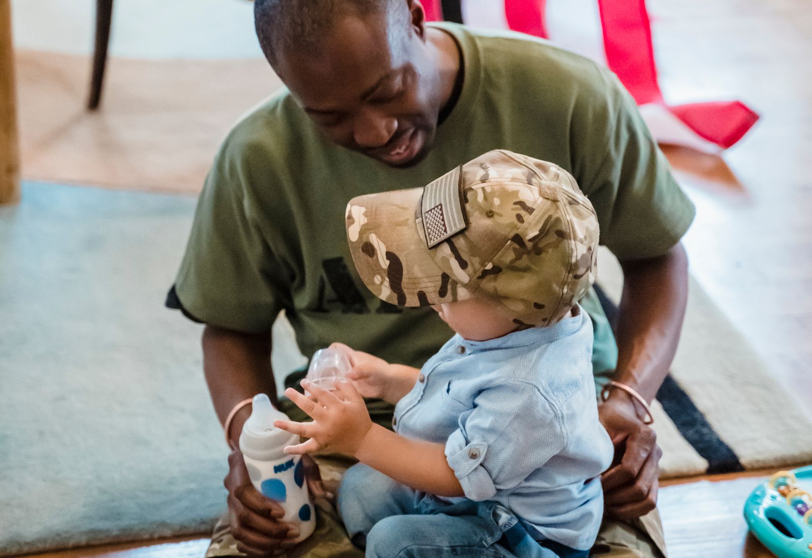 Veteran father holding his baby